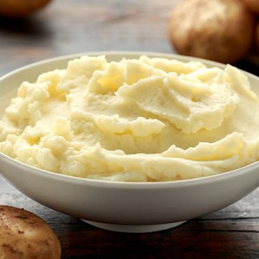 Bowl of tasty mashed potatoes