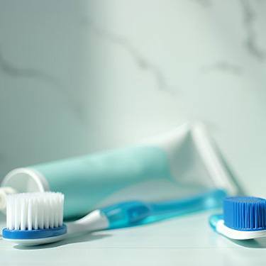 Oral hygiene instruments on bathroom counter