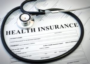 dental insurance form with stethoscope