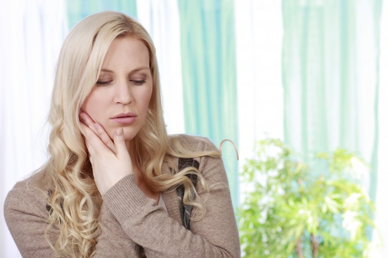 woman in pain from toothache