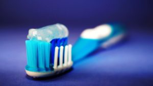 Toothbrush and toothpaste recommended by dentist.